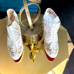 Christian Louboutin   sparkly swarvoski crystal red bottoms